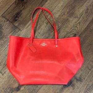 Used twice orange/red Coach shoulder tote!!  Great condition!